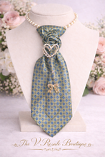 Load image into Gallery viewer, Upcycled Green and Blue patterned Necktie Pearl Necklace with Vintage inspired Heart & Bow Brooch Accents