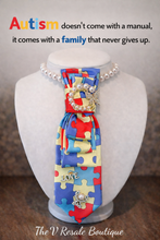 Load image into Gallery viewer, Autism Awareness Puzzle Tie Necklace – Pearl Statement Jewelry