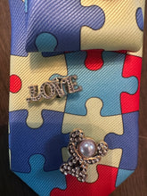 Load image into Gallery viewer, Autism Awareness Puzzle Tie Necklace – Pearl Statement Jewelry