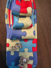 Load image into Gallery viewer, Autism Awareness Puzzle Tie Necklace – Pearl Statement Jewelry