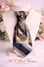 Load image into Gallery viewer, Upcycled Necktie Pearl Necklace – Navy, Gold & Silver Statement Brooch Design