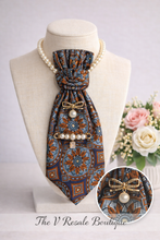 Load image into Gallery viewer, (Blue and Rust Statement Necktie Necklace with Gold Bow Brooch and Pearl Accents
