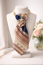 Load image into Gallery viewer, Beige and Navy Statement Necktie Necklace with Gold Star Brooch and Pearl Accents
